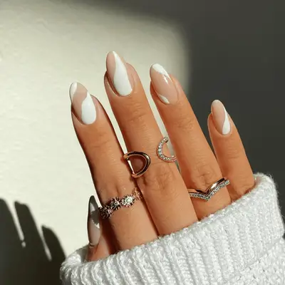 Nude and white abstract nail art 