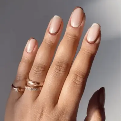 Nude nails with light and dark tips