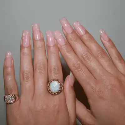Long square pink nails with bubble detail