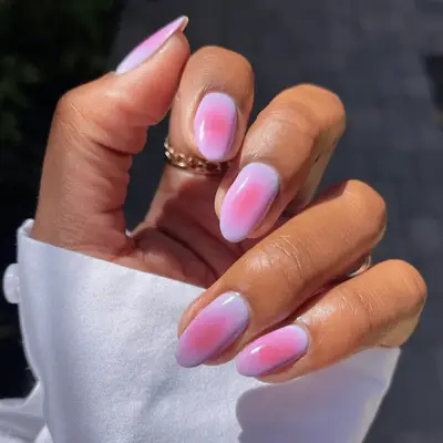 Shot of rhode lip peptide with matching bow nail art