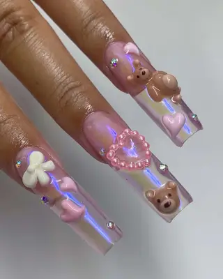 pink nails with bows, hearts and teddy bears 