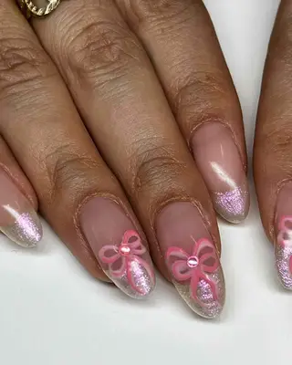 shimmery French tips with pink bows 