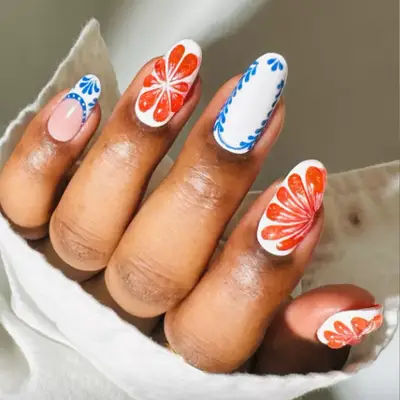 Long nude nails with martini olive nail art 