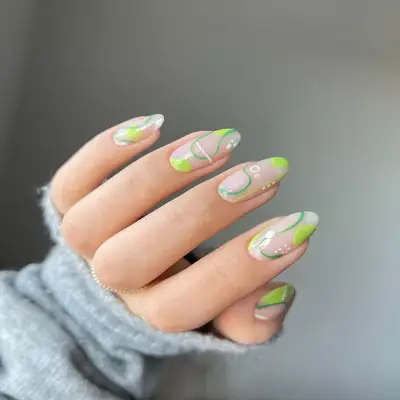 Nude nails with a contemporary design using neon colors