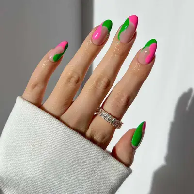 Manicure with pink and green French tips and side wave designs