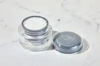 Dermelect Rejuvenail Treatment sitting on a marble counter