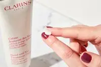 Person tests Clarins Hand and Nail Treatment Cream