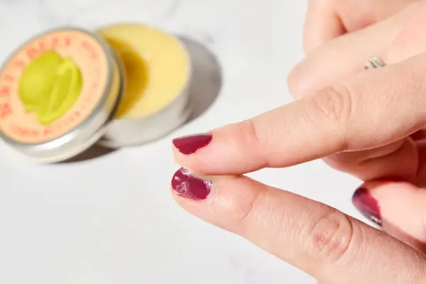 A person applying Burt