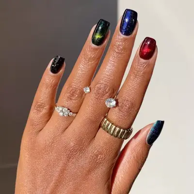 multicolor galaxy-inspired velvet nails