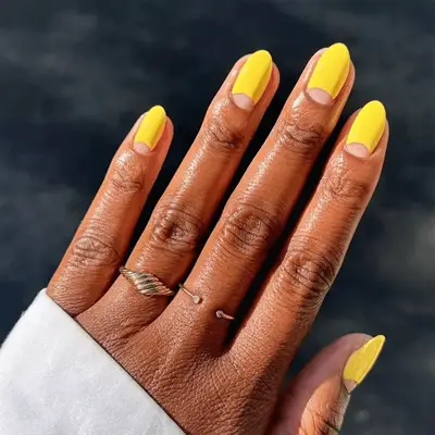bright yellow reverse French manicure