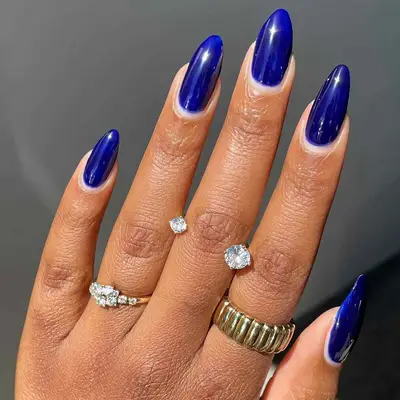 a bright cobalt blue manicure