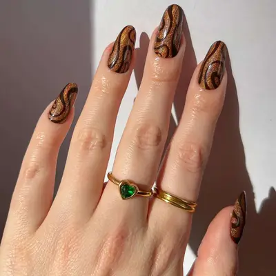 brown glitter swirly nails