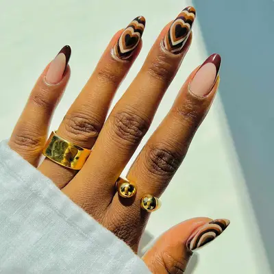 brown cascading heart and french manicure