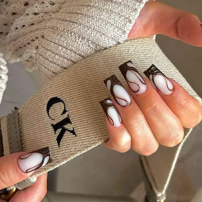 brown and white swirl square nails