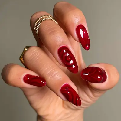 Jammy red manicure with 3D accents