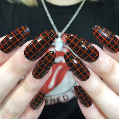 Black and red plaid nail design