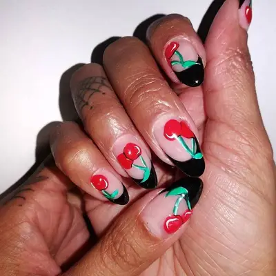 Black and red cherry nail design
