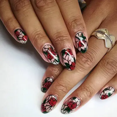 Black and red painted roses nail design
