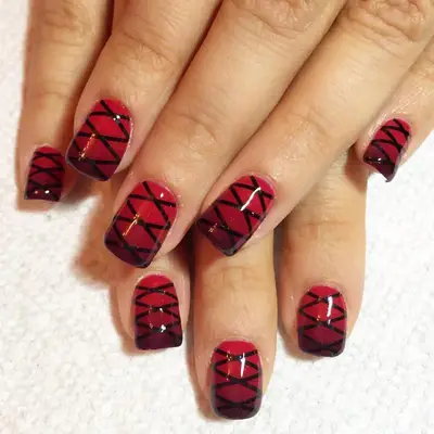 Black and red ombre corset nail design