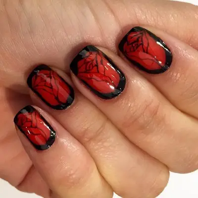 Black and red rose nail design