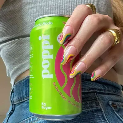 A wavy manicure featuring multiple colors