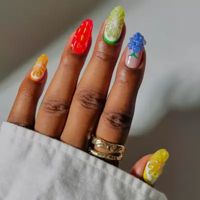 a 3d fruit salad manicure