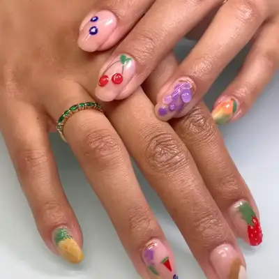 a 3d fruit salad manicure