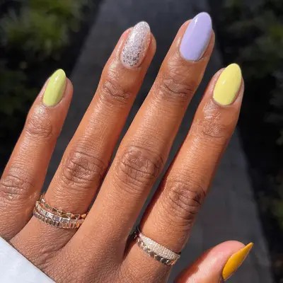 butter yellow and lilac manicure