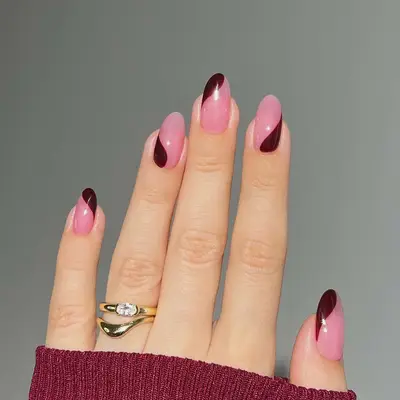 a blush manicure with garnet swirls