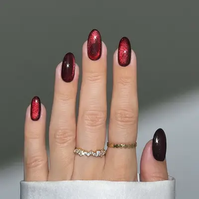 a garnet velvet glass manicure