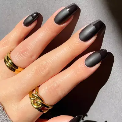 matte black nails with shiny black french tips