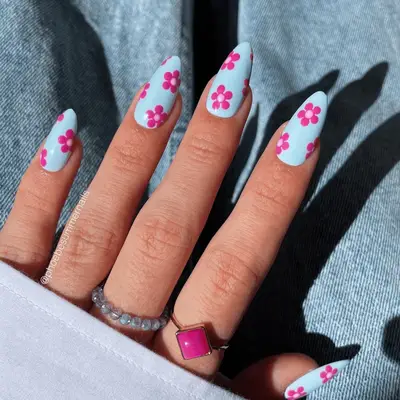 Blue nails with pink flowers
