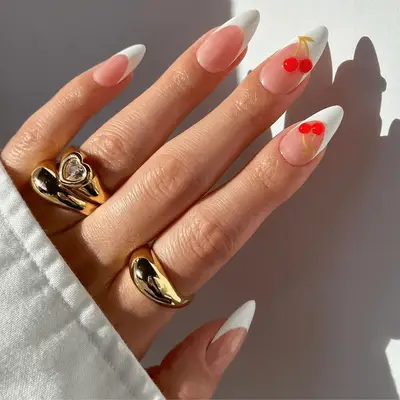 French manicure with cherry details