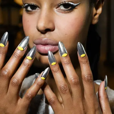 chrome reverse french nails at the libertine show