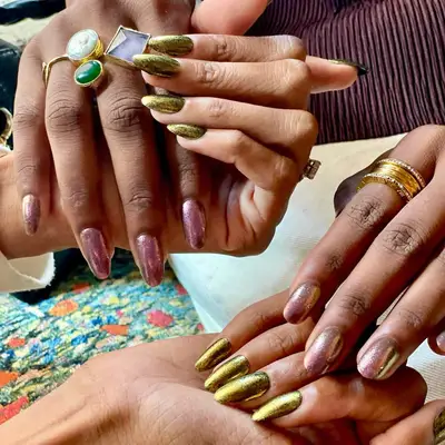 Jewel-toned nails backstage at the Theophilio show