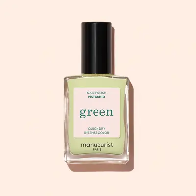 Bottle of Manucurist Green nail polish, pistachio shade, quick dry formula