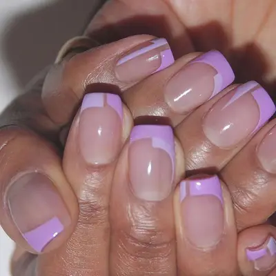 Square nails with geometric purple designs 