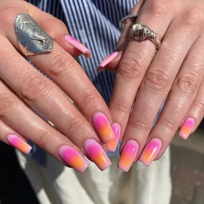 Pink and orange aura manicure on long square nails