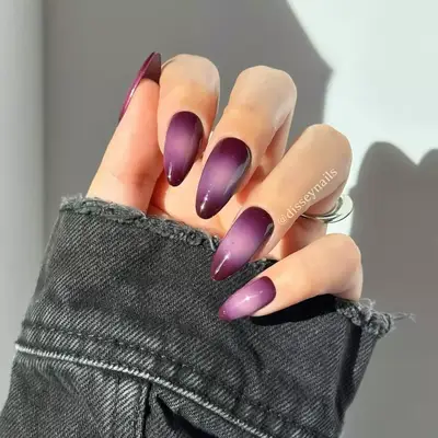 Dark nails with deep purple aura manicure