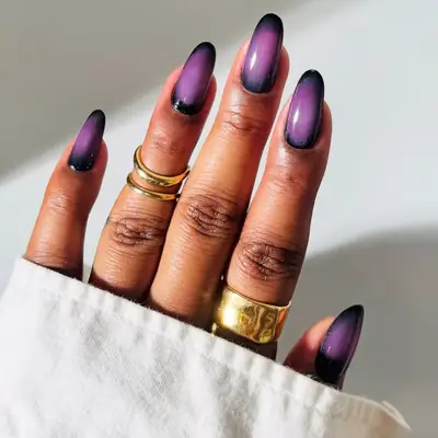 Black and purple aura manicure on long nails