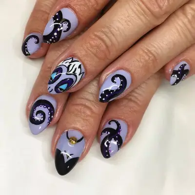 Lilac nails with Ursula tentacles, face, and body designs