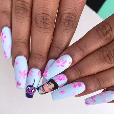 Light blue nails with cherry blossom details and Mulan designs