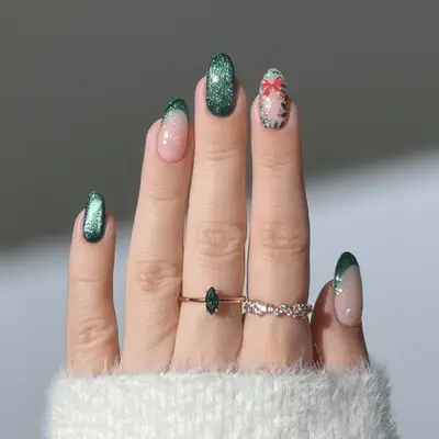 Green velvet nails with a holly wreath accent nail.