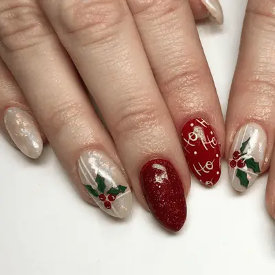 Mismatched Christmas nails with holly details and 