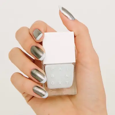 Gray metallic nails with cool pale gray French tips