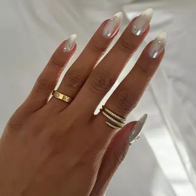 milky nails with chrome topper