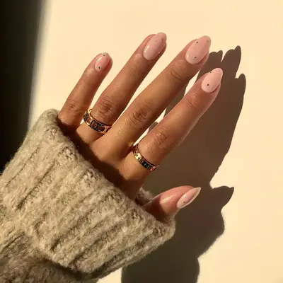 strawberry milky manicure with sparkle details