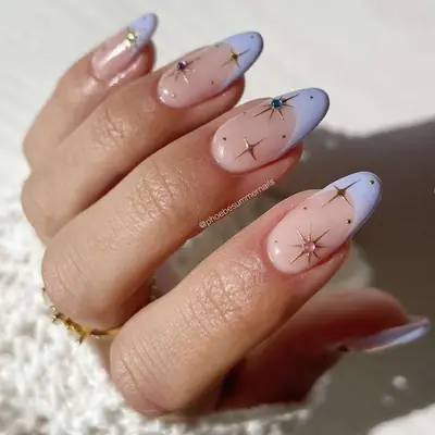 pastel periwinkle french tips with gold accents