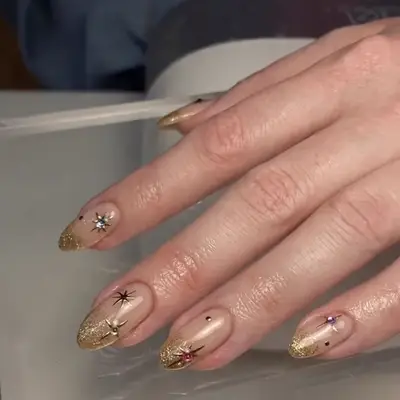 gold glittery french manicure 