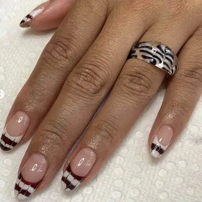 french tips with brown and white swirls